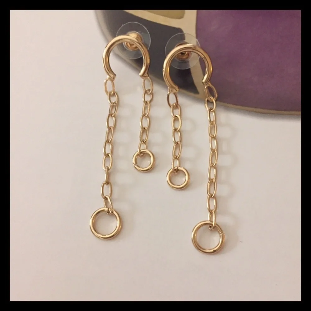 Aqua/Bloomingdales dangling earring